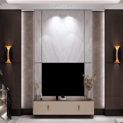 Modern Curl Wall Sconce with Dual Lighting | Sculptural Black Metal Fixture for Ambient Indoor Illumination