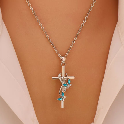 Silver Cross Necklace with Bow and Blue Gem Accents | Elegant Faith-Inspired Jewelry for Everyday Wear