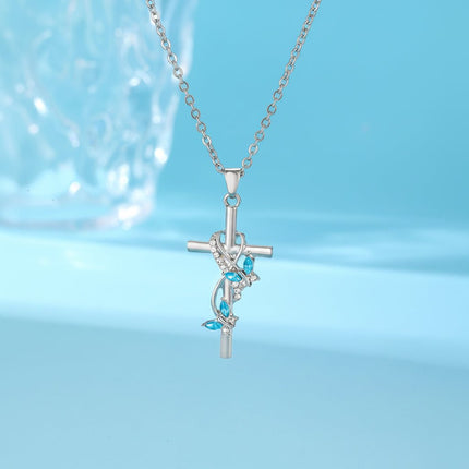 Silver Cross Necklace with Bow and Blue Gem Accents | Elegant Faith-Inspired Jewelry for Everyday Wear