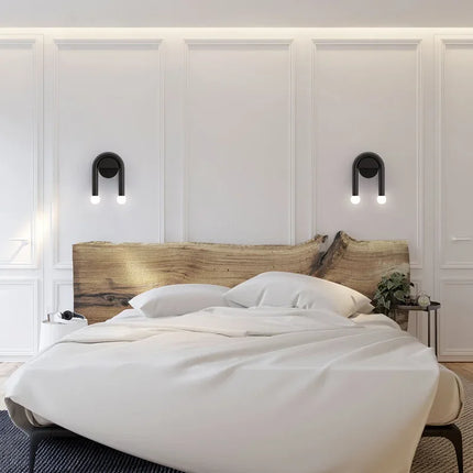 Modern Wall Light with Sculptural Arch Design | Matte Black Iron & Frosted Glass for Warm Ambient Glow