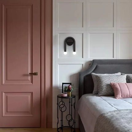 Modern Wall Light with Sculptural Arch Design | Matte Black Iron & Frosted Glass for Warm Ambient Glow