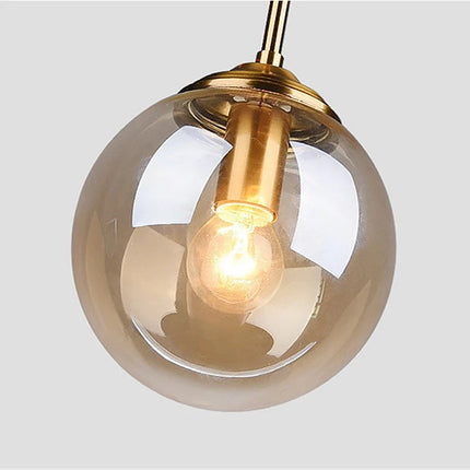 Modern Nordic Glass Globe Pendant Light with Adjustable Height | Warm Illumination for Stylish Spaces