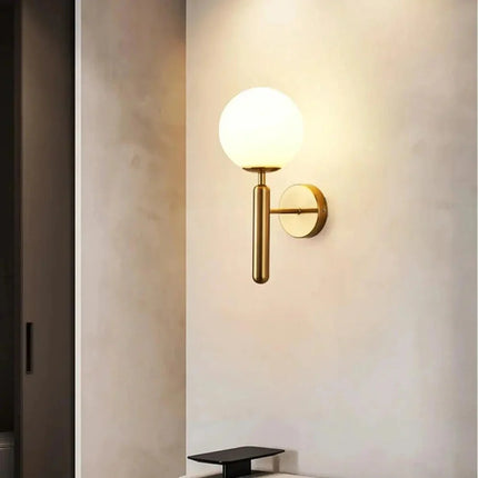 Wall Sconce with Frosted or Rippled Glass Globe | Matte Black or Brushed Gold Finish for Ambient Lighting 4