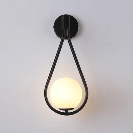 Teardrop Wall Light with Frosted Glass Globe | Modern Accent Lighting for Elegant Interiors