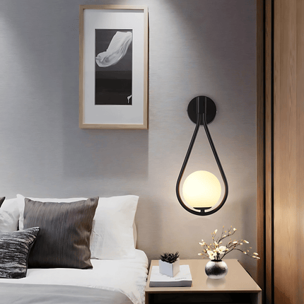 Teardrop Wall Light with Frosted Glass Globe | Modern Accent Lighting for Elegant Interiors