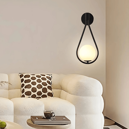 Teardrop Wall Light with Frosted Glass Globe | Modern Accent Lighting for Elegant Interiors