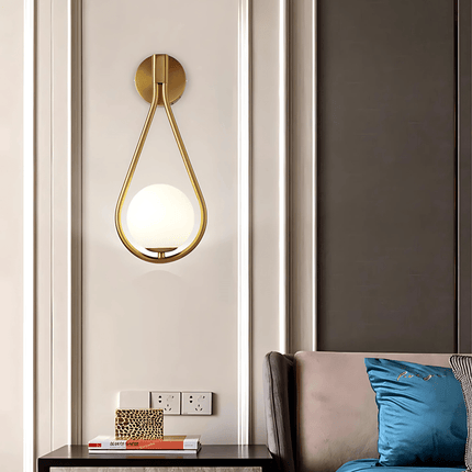 Teardrop Wall Light with Frosted Glass Globe | Modern Accent Lighting for Elegant Interiors