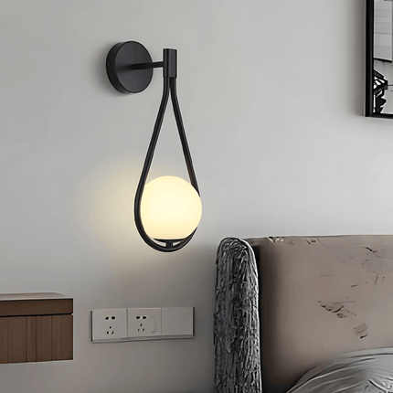 Teardrop Wall Light with Frosted Glass Globe | Modern Accent Lighting for Elegant Interiors