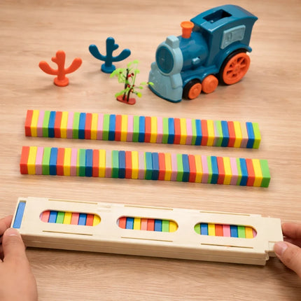 Domino Train Toy Set for Kids that Lays Dominoes Automatically for Cause and Effect Play, 2 Color Options