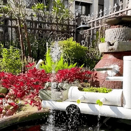 Solar-Powered Water Fountain with Adjustable Spray Height | Elegant Design for Garden Serenity